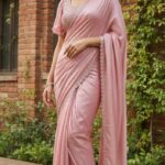 PEACH COLOUR EX FANCY SAREE WITH BUTTERFLY SLEEVE BLOUSE